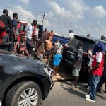A shirtless Anthony Joshua at the scene of accident at Lagos-Ibadan Expressway