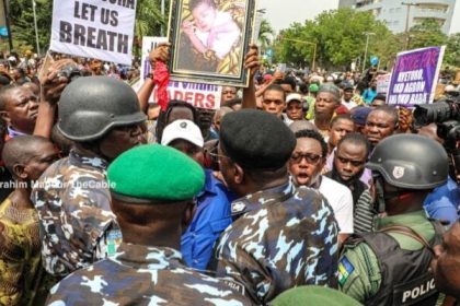 Lagos anti-demolition protest with Hassan in white T-shirt