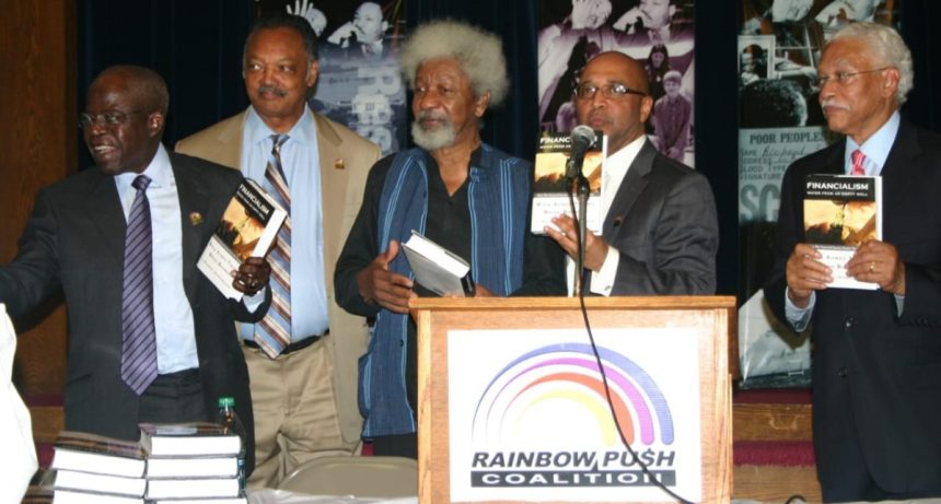 L-R: President Bola Tinubu, Reverend Jesse Jackson, Prof. Wole Soyinka, and others