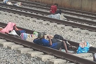 People sleeping on tracks of the Lagos-Ibadan rail at the Agege station in Lagos (Photo: Remi Sonaiya)