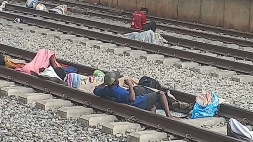 People sleeping on tracks of the Lagos-Ibadan rail at the Agege station in Lagos (Photo: Remi Sonaiya)