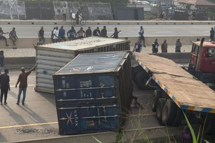 Otedola Bridge Blocked After Truck Carrying Two Containers Tips Over