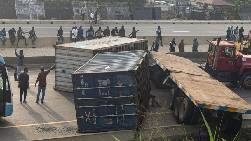 Otedola Bridge Blocked After Truck Carrying Two Containers Tips Over