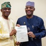 Minister of Education, Tunji Alausa (Right), presenting the certificate of appointment to Prof. Onibon (Left) as the Pioneer Rector of Bola Ahmed Tinubu Federal Polytechnic, Abuja