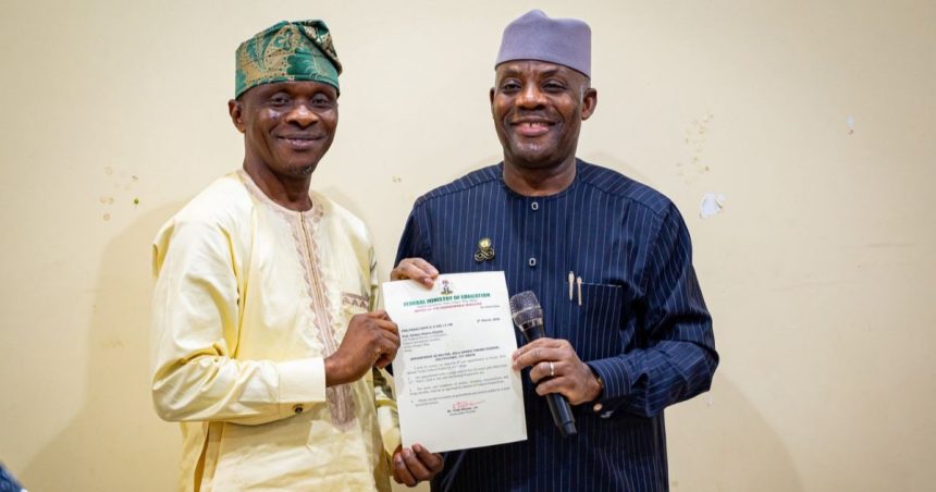 Minister of Education, Tunji Alausa (Right), presenting the certificate of appointment to Prof. Onibon (Left) as the Pioneer Rector of Bola Ahmed Tinubu Federal Polytechnic, Abuja