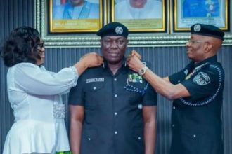 New Commissioner of Police, Lagos State Command, Tijani Olaiwola Fatai (middle) during his formal decoration as CP last year by the former IGP Kayode Egbetokun