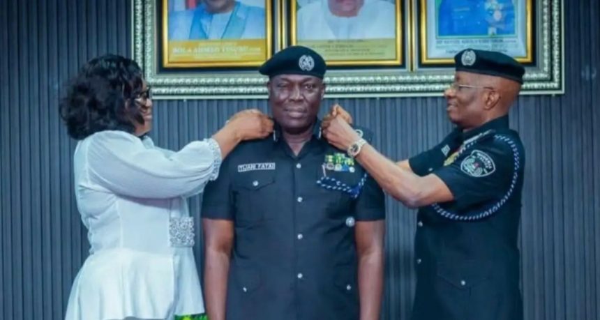 New Commissioner of Police, Lagos State Command, Tijani Olaiwola Fatai (middle) during his formal decoration as CP last year by the former IGP Kayode Egbetokun