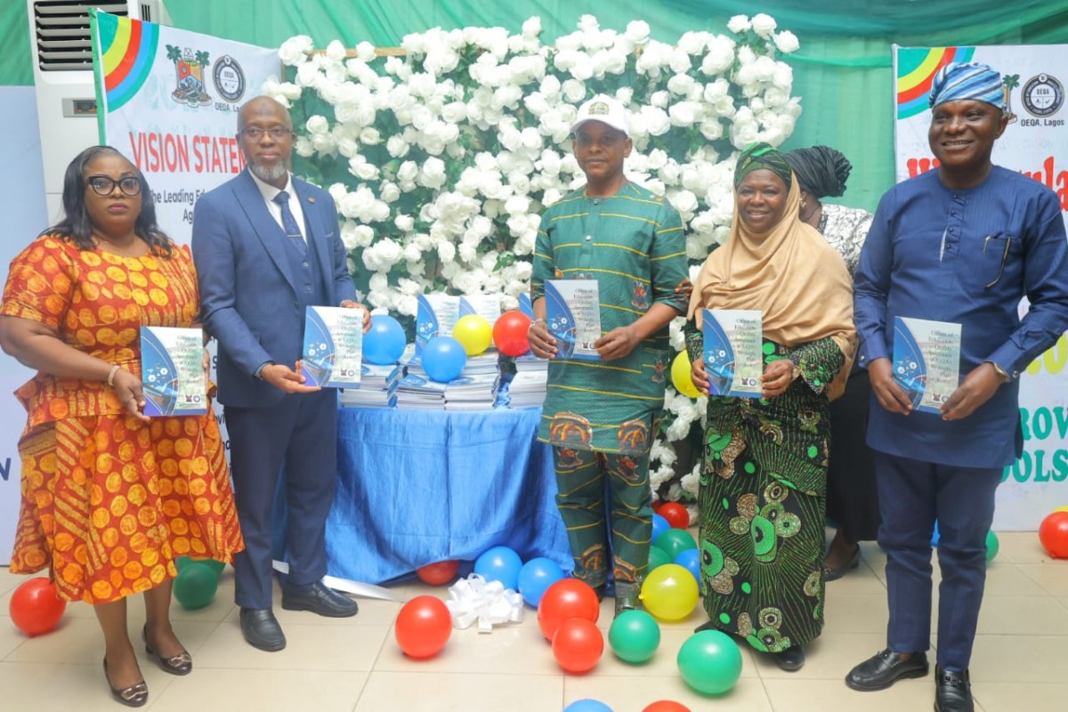 Lagos State Commissioner for Basic and Secondary Education (MB&SE), Mr. Jamiu Tolani Alli-Balogun and other stakeholders with copies of the OEQA Strategic Plan aimed at raising education standards in Lagos