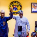 Lagos State Governor, Babajide Sanwo-Olu (Middle) raising the hand of Deputy Governor, Obafemi Hamzat (Left), in support of his 2027 governorship ambition