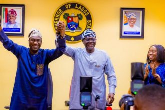 Lagos State Governor, Babajide Sanwo-Olu (Middle) raising the hand of Deputy Governor, Obafemi Hamzat (Left), in support of his 2027 governorship ambition