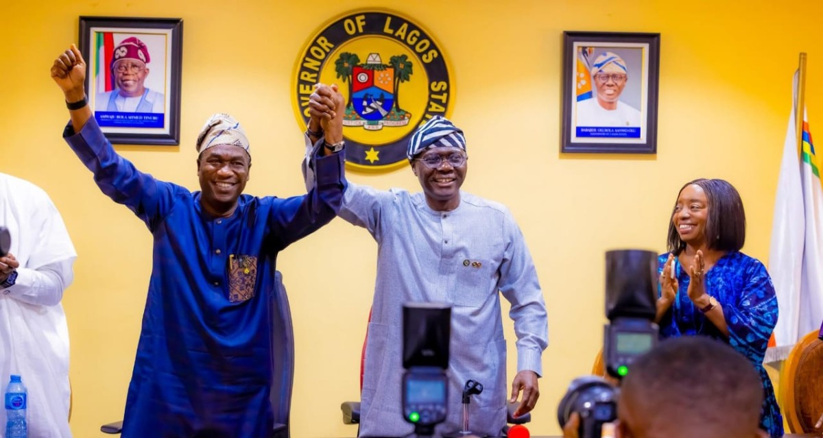 Lagos State Governor, Babajide Sanwo-Olu (Middle) raising the hand of Deputy Governor, Obafemi Hamzat (Left), in support of his 2027 governorship ambition