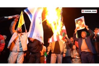Tehran Protesters Burn US, Israeli Flags Amid Skepticism Over Newly Announced Ceasefire
