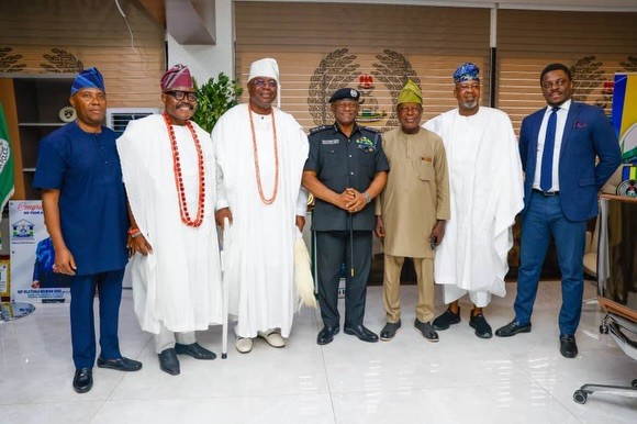 Alara of Ilara Kingdom, Oba Olukayode Olufolarin Ogunsanwo (Telade IV), IGP Tunji Disu, and others during a congratulatory visit to the police chief in Abuja