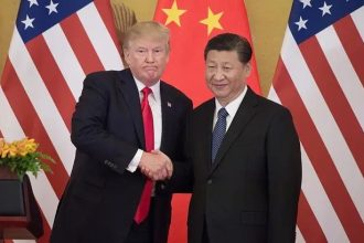 Trump Lands In Beijing With Tech Titans For High-Stakes Superpower Summit With Xi
