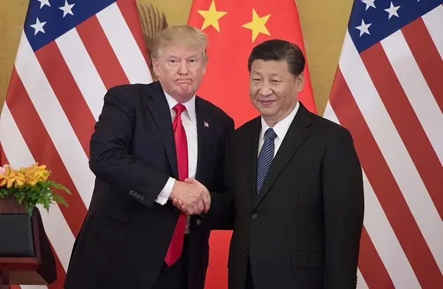 Trump Lands In Beijing With Tech Titans For High-Stakes Superpower Summit With Xi