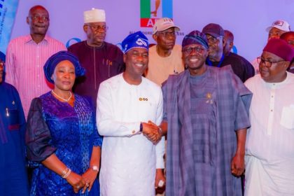 Lagos State Governor, Babajide Sanwo-Olu congratulates Deputy Governor and APC governorship candidate, Obafemi Hamzat, after winning the primary election