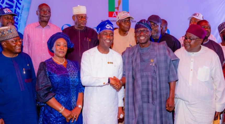 Lagos State Governor, Babajide Sanwo-Olu congratulates Deputy Governor and APC governorship candidate, Obafemi Hamzat, after winning the primary election