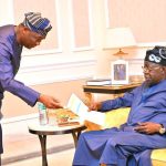 Lagos Deputy Governor, Obafemi Hamzat and APC governorship candidate, Obafemi Hamzat presenting the official results of the Lagos APC gubernatorial primary to President Bola Tinubu