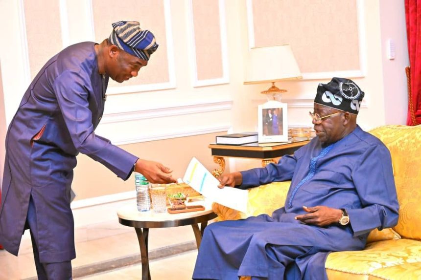 Lagos Deputy Governor, Obafemi Hamzat and APC governorship candidate, Obafemi Hamzat presenting the official results of the Lagos APC gubernatorial primary to President Bola Tinubu
