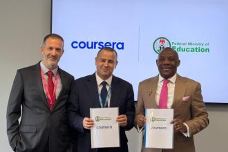 Minister of Education, Tunji Alausa, and Coursera executives with the Digital Training Academy (DTA) agreement in London