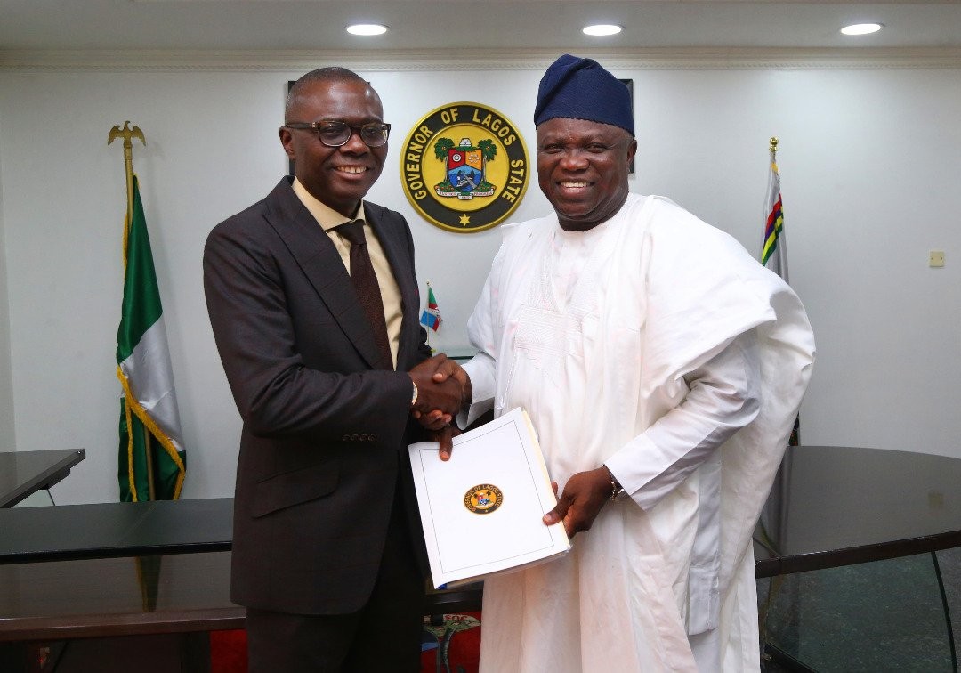 Former Lagos State Governor, Akinwunmi Ambode, handing over to his successor, Babajide Sanwo-Olu in May 2019