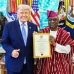 Kayode Are Presents Credentials to Trump