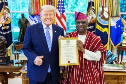Kayode Are Presents Credentials to Trump