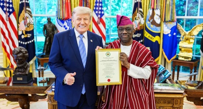 Kayode Are Presents Credentials to Trump