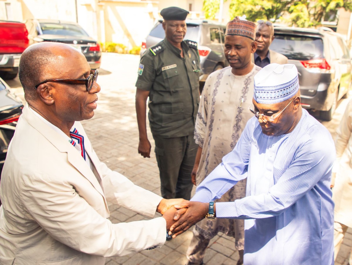 ADC vice-presidential candidate, Rotimi Amaechi and the party's presidential candidate, Atiku Abubakar