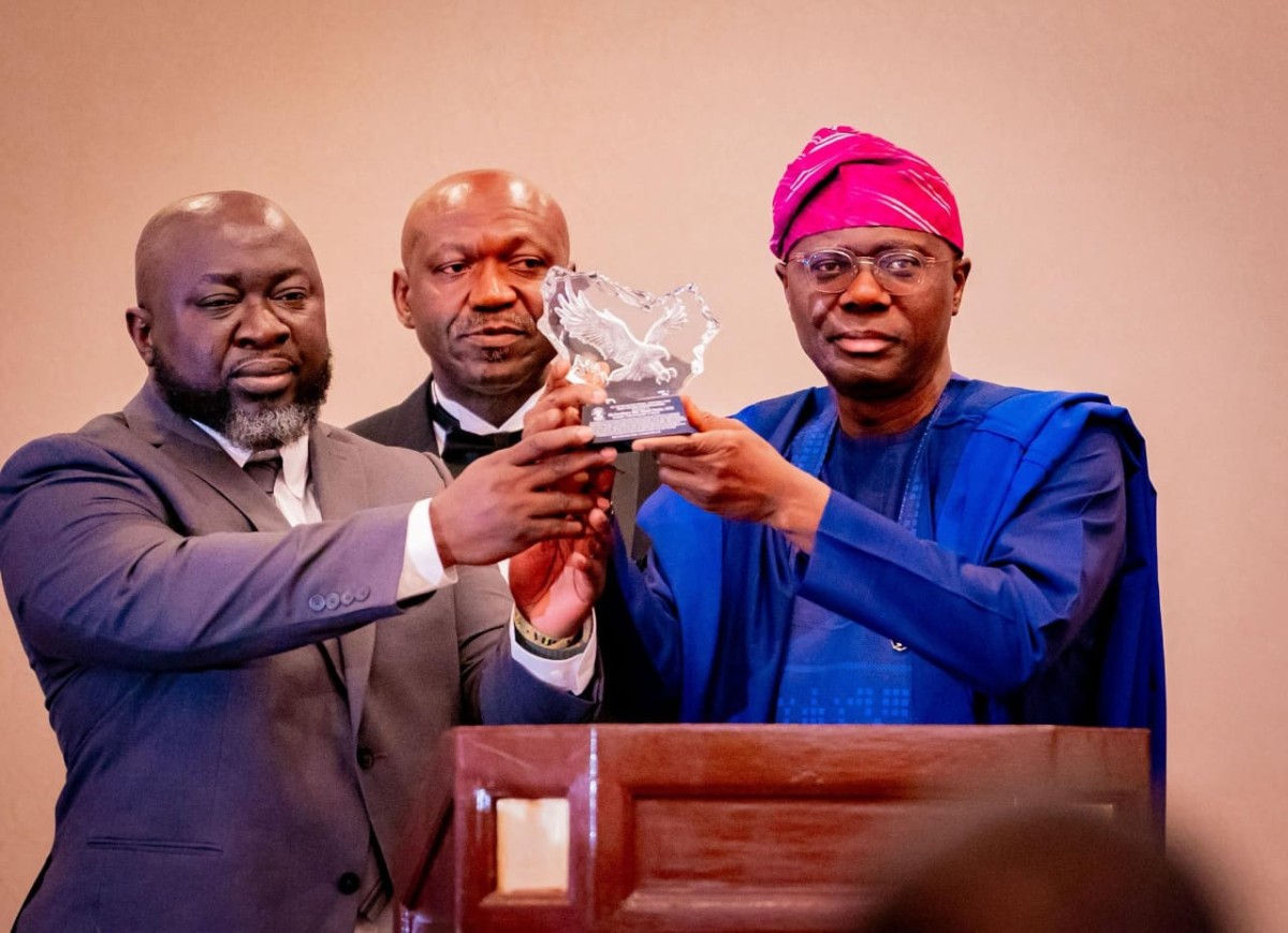 Lagos State Governor, Babajide Sanwo-Olu, receiving the Eko Club International Lifetime Achievement Award on behalf of President Bola Ahmed Tinubu last September 