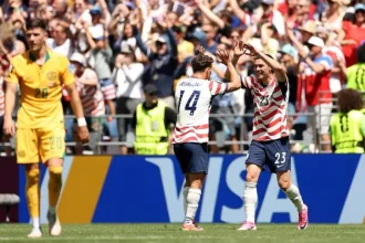 USA Top Group Despite Defeat