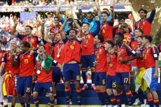 Spain's Rodri lifts the World Cup trophy alongside teammates as they celebrate winning the World Cup after a 1-0 extra-time victory over Argentina in New Jersey today. Photo: Reuters