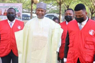 Former Attorney-General of the Federation (AGF), Abubakar Malami (middle), flanked by EFCC officers, arriving at the Federal High Court in Abuja following his arraignment over allegations bordering on money laundering