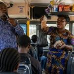 File photo of a preacher and a trader in a commercial vehicle