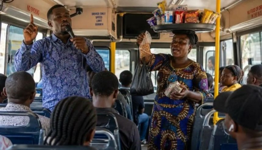 File photo of a preacher and a trader in a commercial vehicle