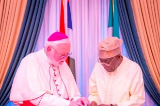 President Bola Tinubu exchanges a handshake with Pope Leo XIV...Photo Credit: Guardian Nigeria