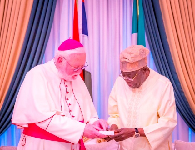 President Bola Tinubu exchanges a handshake with Pope Leo XIV...Photo Credit: Guardian Nigeria