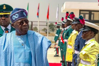 President Bola Ahmed Tinubu GCFR at the Nigerian Defence Academy (NDA) 60th Anniversary Trooping and Presentation of Colours Parade at Oliver Nzalgana Parade Ground, Afaka, Kaduna, Nigeria