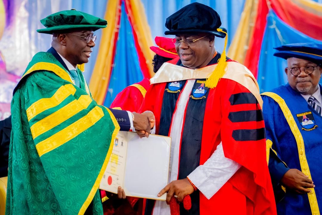 Lagos State Governor, Babajide Sanwo-Olu, presenting the Doctor of Business Administration (DBA) certificate to Alara of Ilara Kingdom, His Royal Majesty Oba Olufolarin Olukayode Ogunsanwo