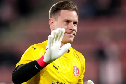 Ajax Sign Barcelona Goalkeeper Marc Andre Ter Stegen On Loan Dutch giants Ajax have completed the signing of Barcelona goalkeeper Marc Andre ter Stegen on a season long loan for the 2026/27 campaign. Ajax confirmed the deal on Tuesday, announcing that an agreement had been reached with Barcelona and the experienced Germany international. “Ajax has reached an agreement with Barcelona and Marc ter Stegen,” the Eredivisie club said in a statement. The 34 year old goalkeeper has been with Barcelona since joining the Spanish club in 2014 and has enjoyed a trophy laden spell at the Camp Nou. However, the veteran shot stopper has struggled with injury problems over the past two seasons, limiting his appearances for both club and country. With Joan Garcia firmly established as Barcelona's first choice goalkeeper, Ter Stegen was loaned to Girona in January in search of regular playing time. His spell at Girona was cut short after he suffered a hamstring injury during his second appearance for the club in February, an injury that ruled him out for the remainder of the season. The injury also saw the Germany international miss selection for his country's squad at the 2026 FIFA World Cup. Despite his recent fitness setbacks, Ter Stegen remains one of Europe's most decorated goalkeepers, having won the UEFA Champions League and seven La Liga titles during his time with Barcelona. The goalkeeper is still under contract with Barcelona until June 2028, but will now spend the 2026/27 season with Ajax as he looks to regain full fitness and regular first team football.